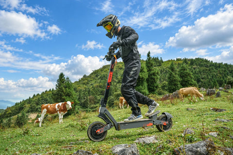 KuKirin electric scooter rider exploring an outdoor trail