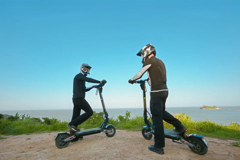 KuKirin electric scooter with a rider on an outdoor route