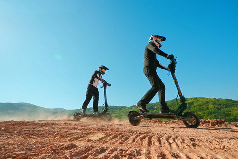KuKirin electric scooter with rider in an everyday commuting setting